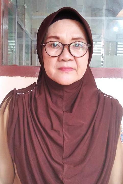 YUMI MOKOAGOW, S.Pd.