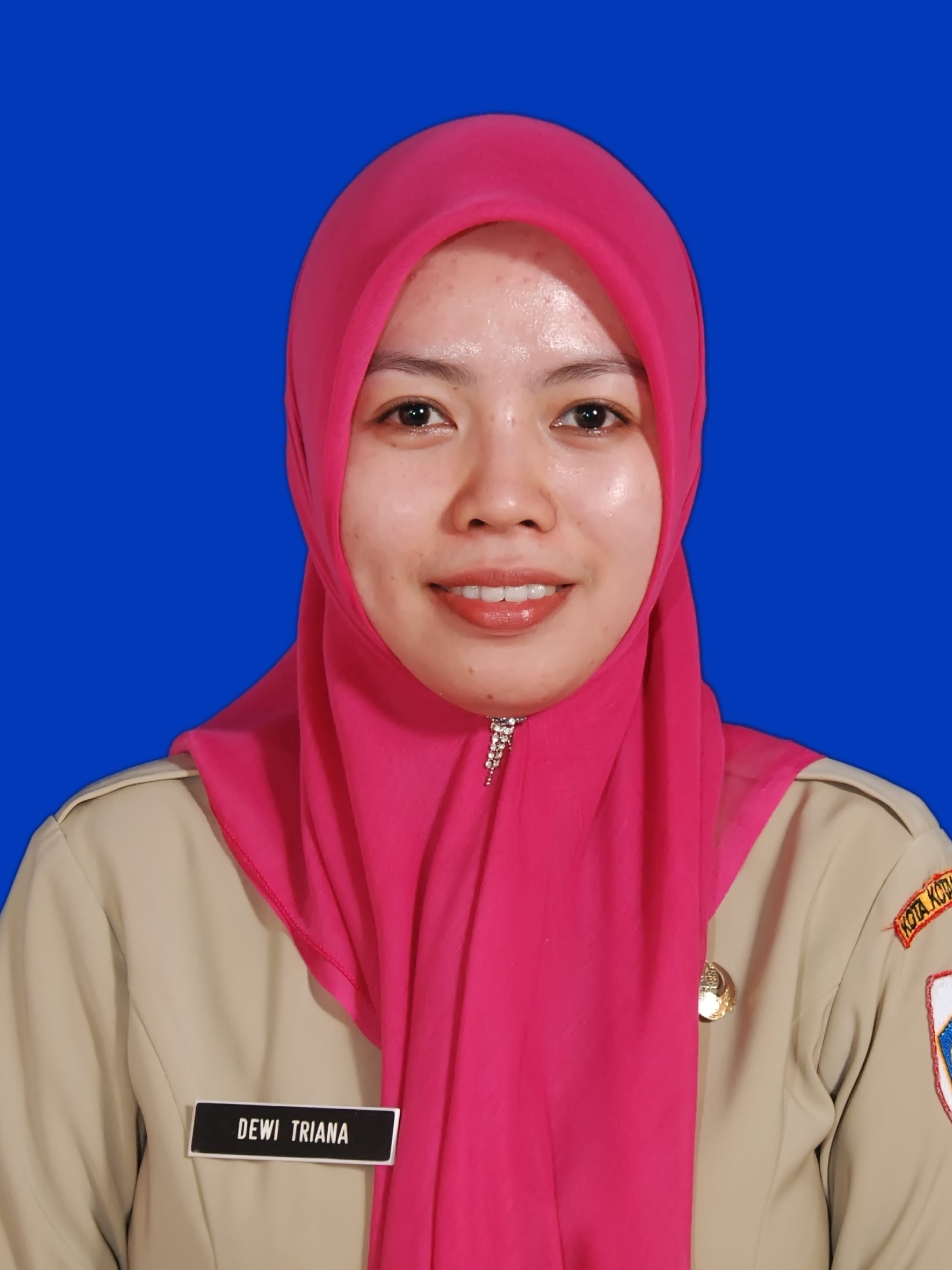 DEWI TRIANA MOKOGINTA, S.Sos.