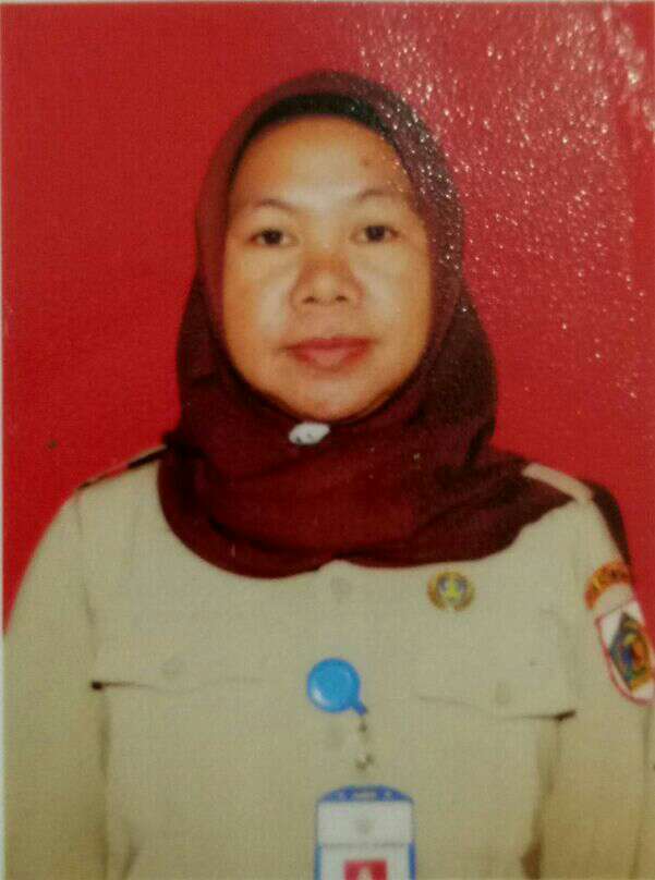 TELLY MOKODOMPIT, S.Pd.