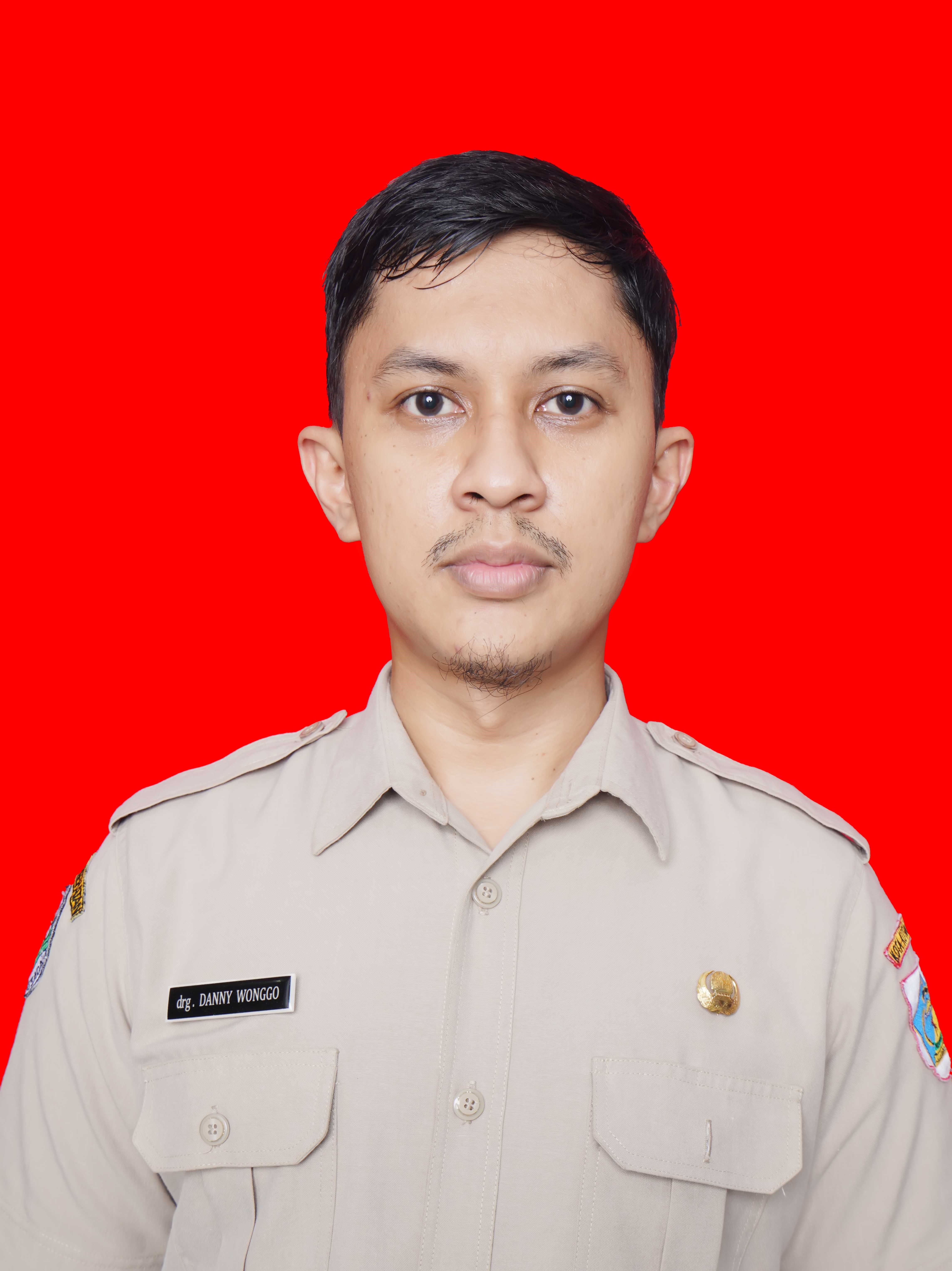 drg. DANNY INDRAWAN WONGGO