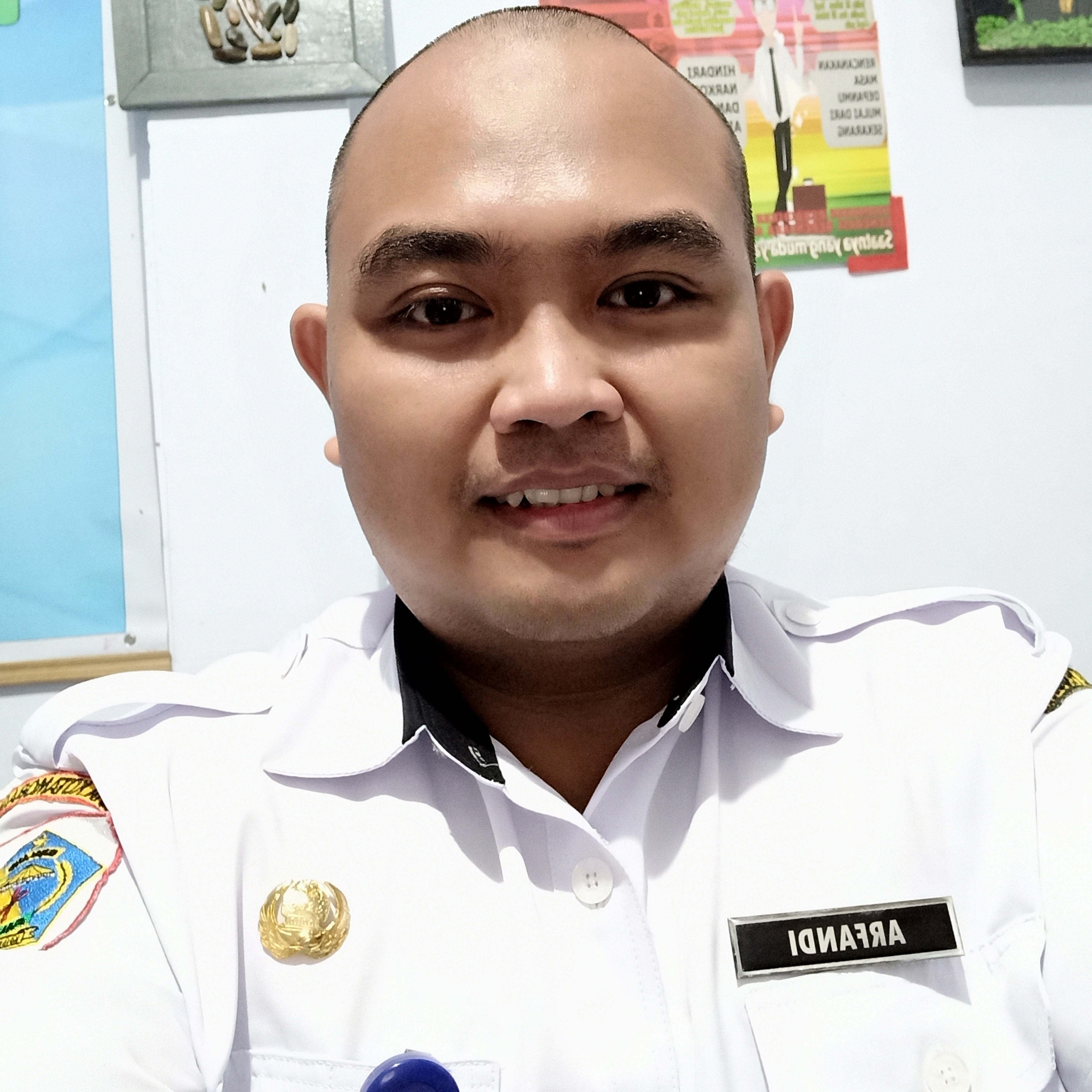 Muhammad Arfandi Monoarfa, S.Pd.