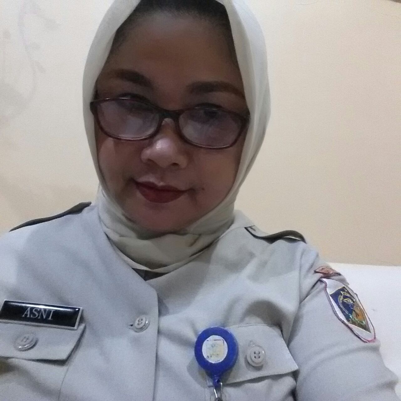 ASNI L.TOMBAAN, S.Psi.