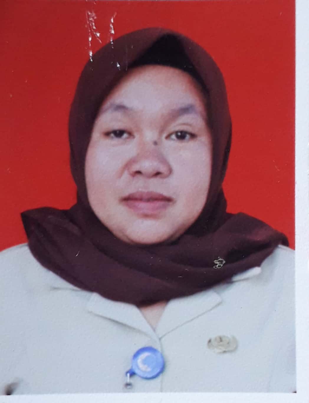 HETSIY MOKODOMPIT, S.Pd.