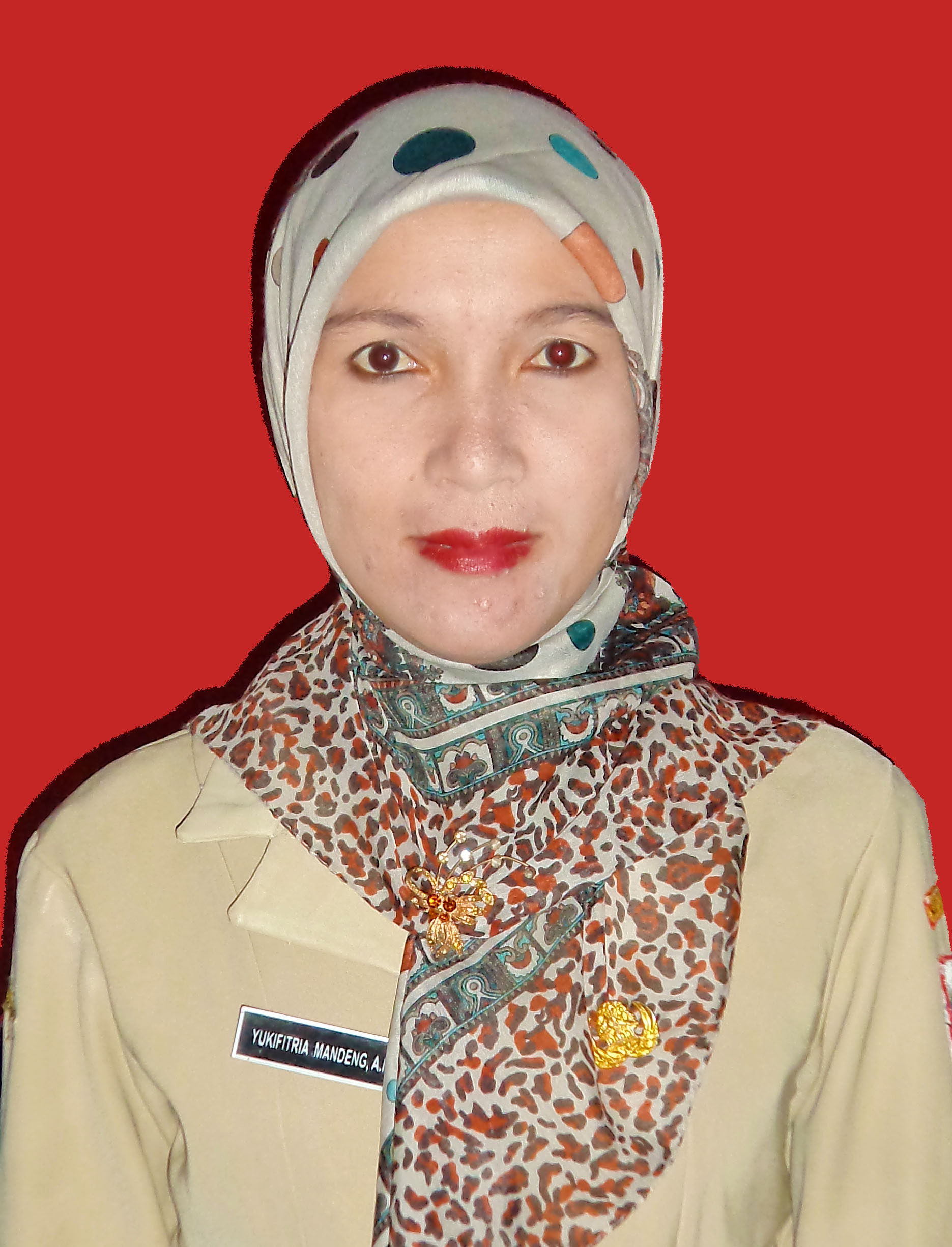 YUKIFITRIA MANDENG, S.Pd.