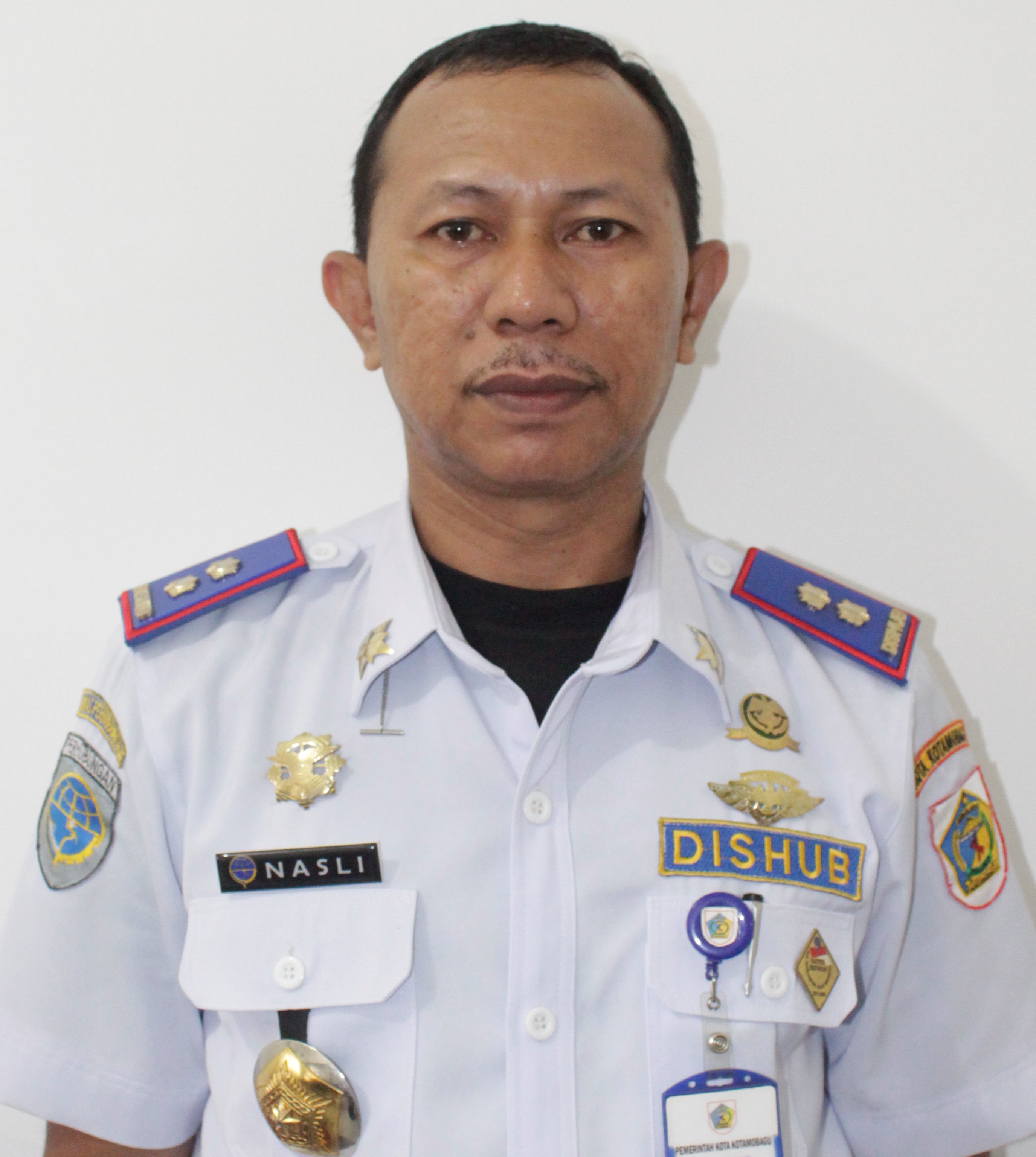NASLI PAPUTUNGAN, S.E.