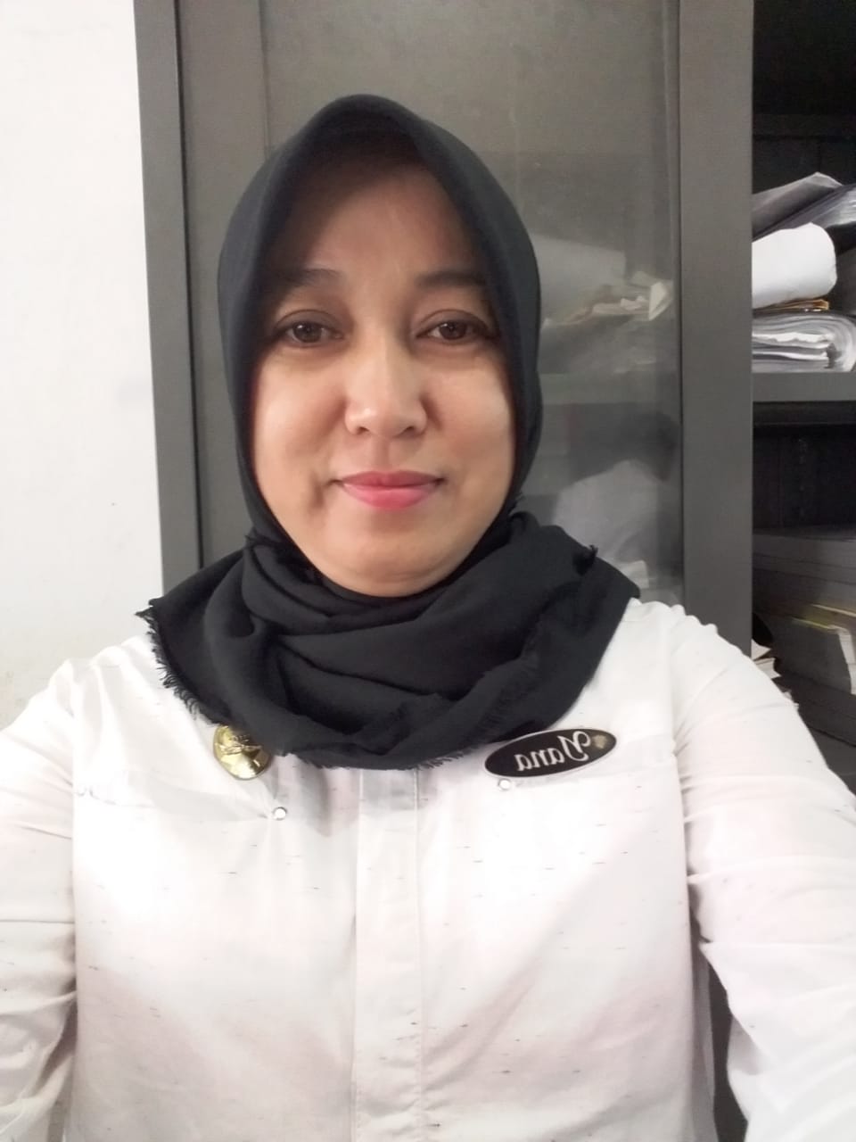 YANA TUNGKAGI, S.M