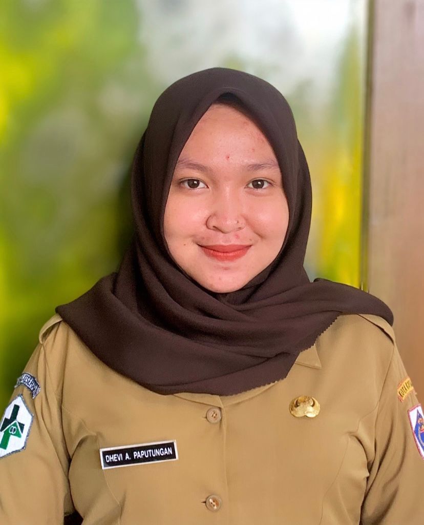 DHEVI ARISKA PAPUTUNGAN, S.Tr.Gz.