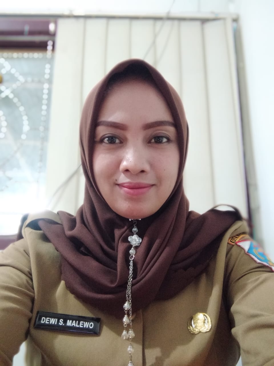 DEWI SINTA MALEWO, S.E.
