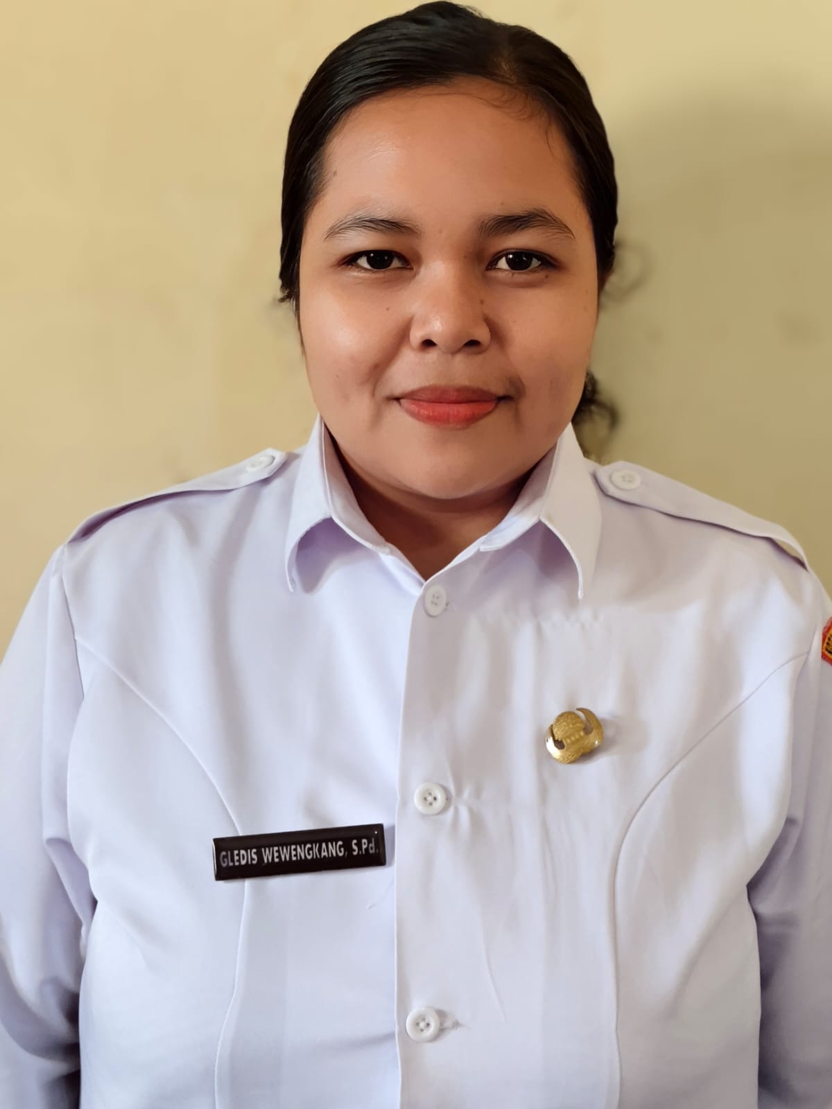 GLEDIS WEWENGKANG, S.Pd.