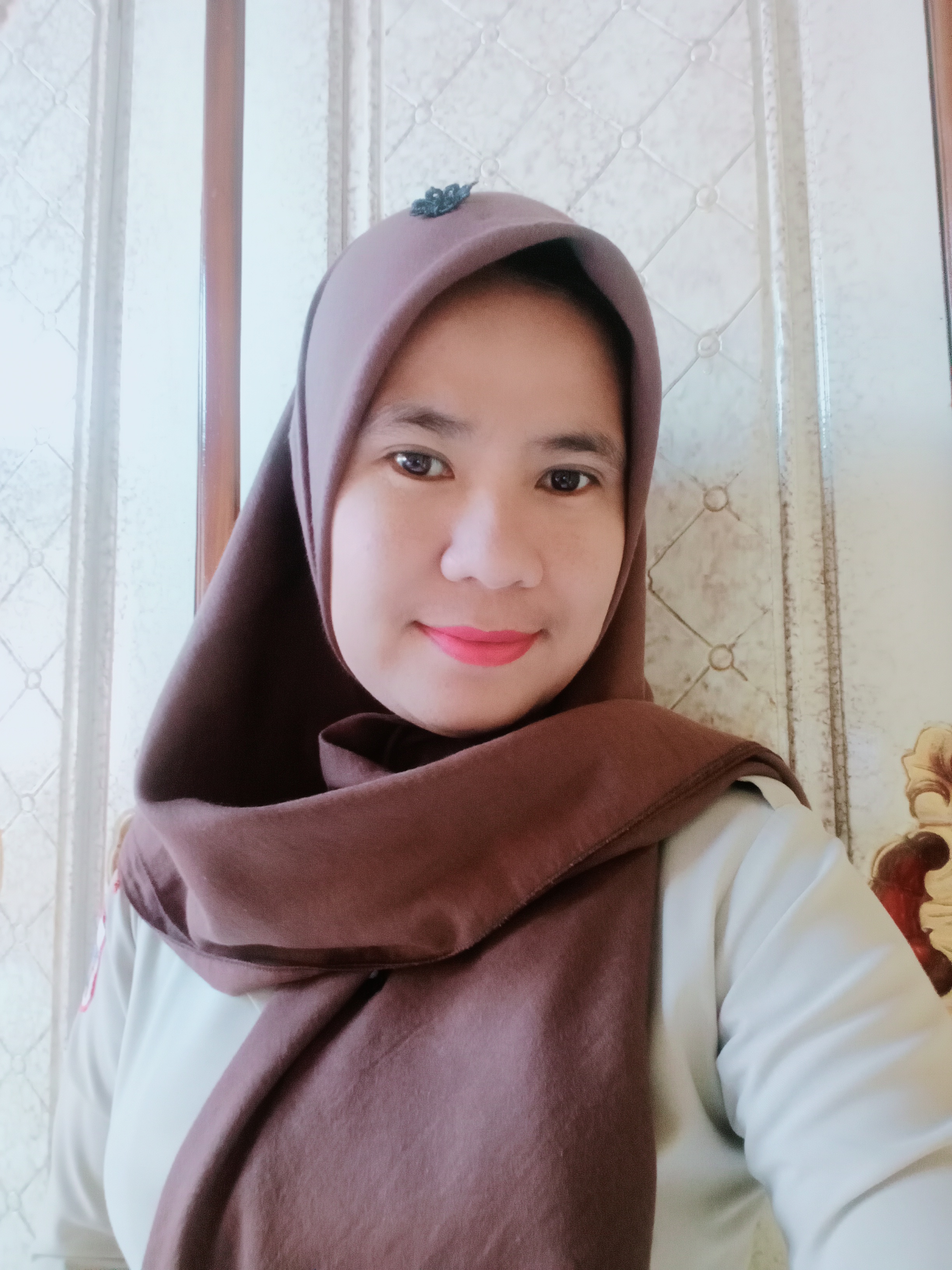 CINDRA PAPUTUNGAN, S.Si.