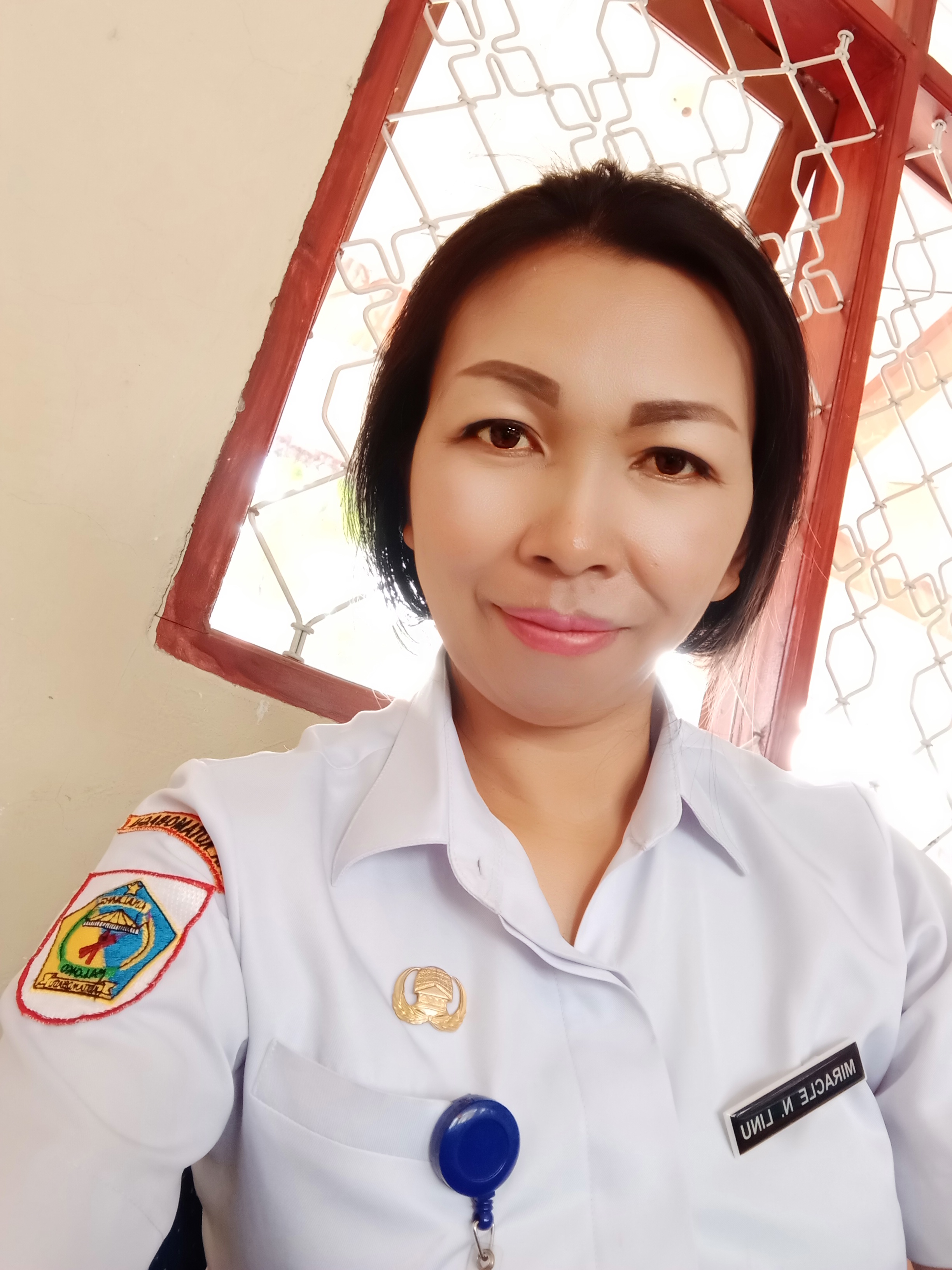 MIRACLE NANCY LINU, S.Pd.