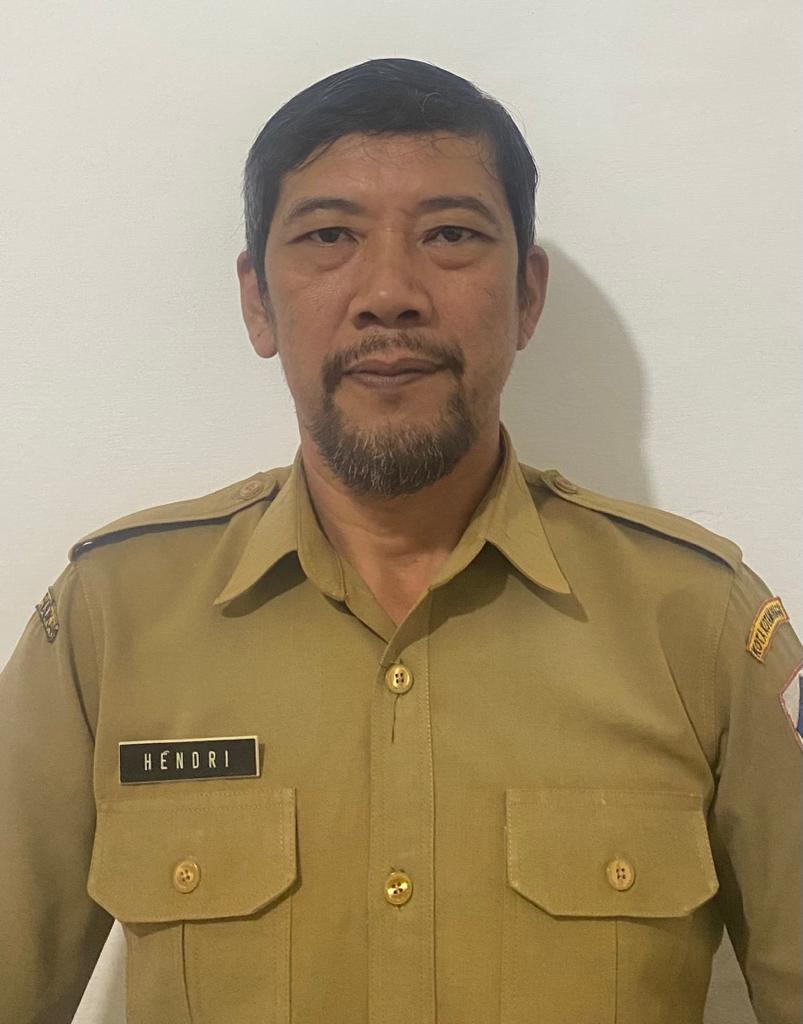 HENDRI RISMAN MOKOGINTA, S.Pd.