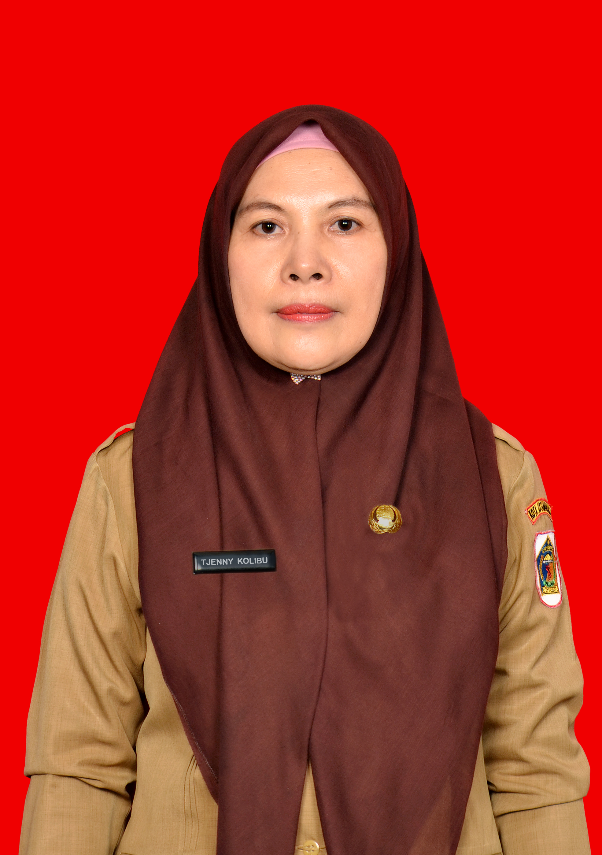TJENNY SANDRA KOLIBU, S.Pd.