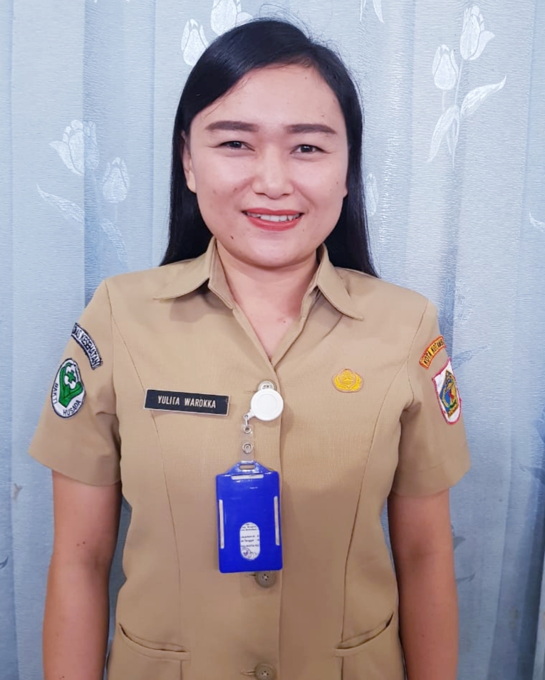 YULITA WAROKKA, S.K.M.