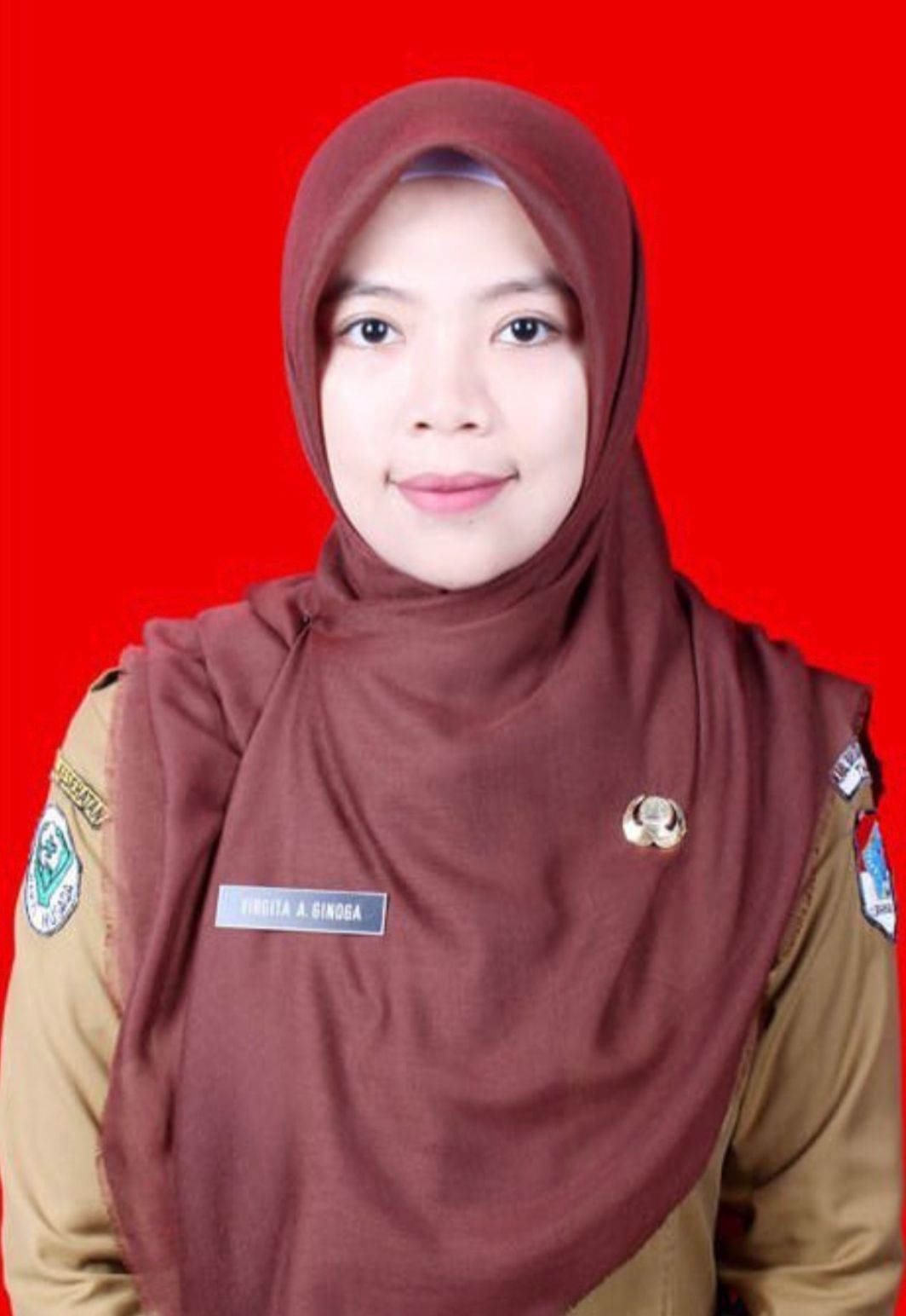 VIRGITA APRIANI GINOGA, SKM