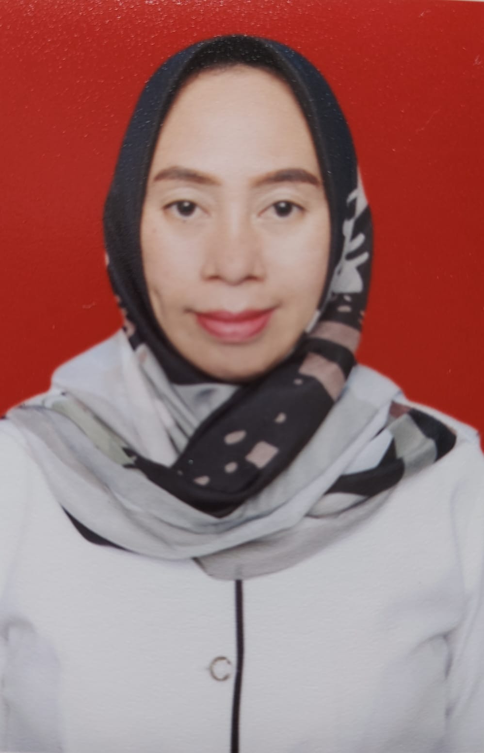 RAHAYUNI MOKODOMPIT, S.Pd.