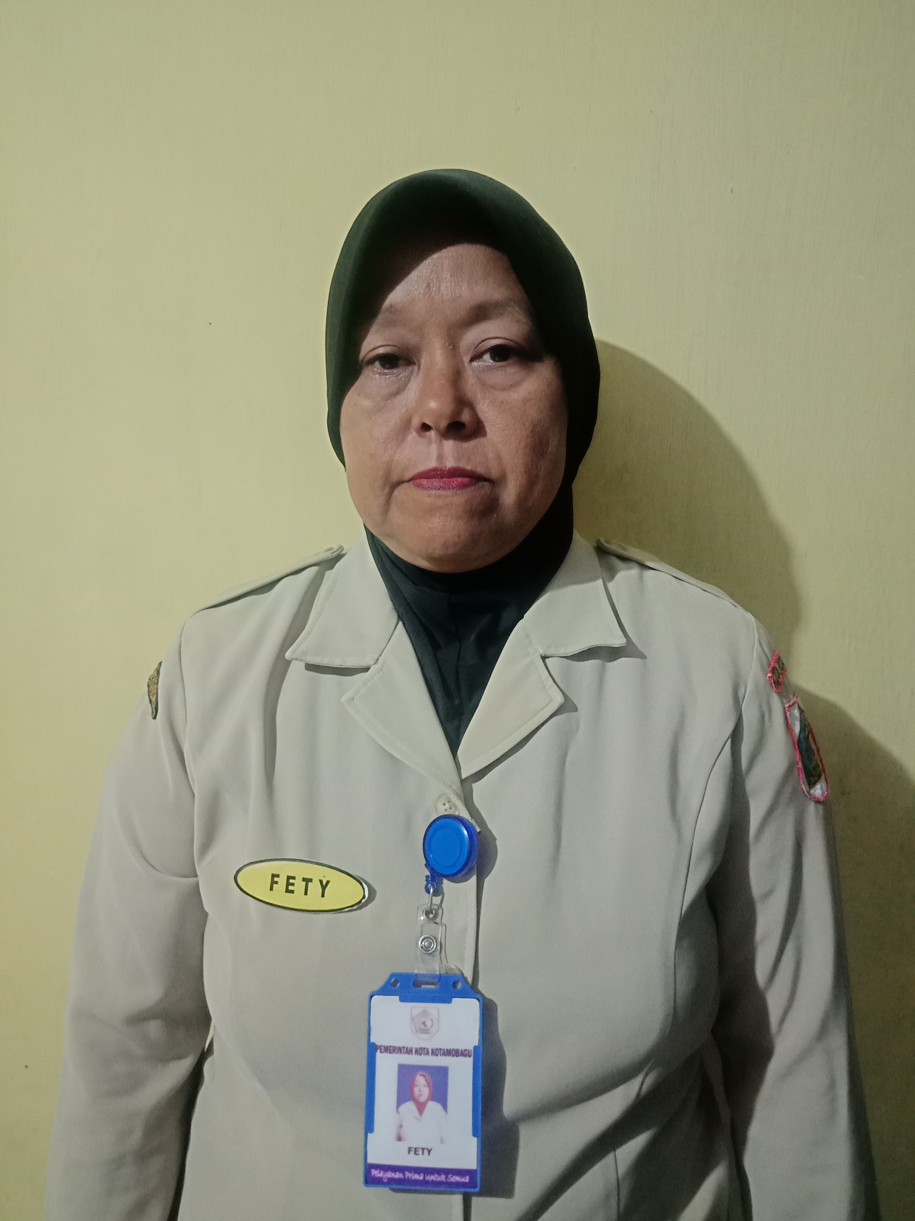 FETY MOKODONGAN, A.Md.