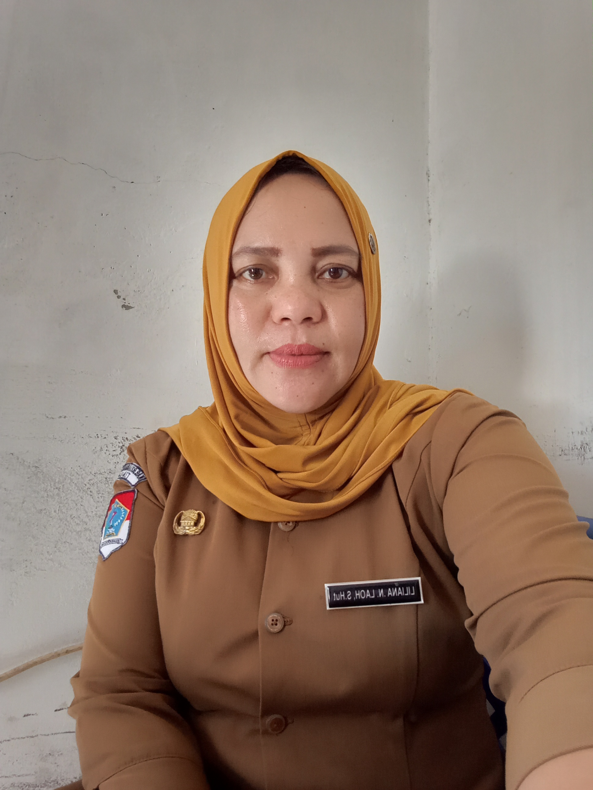 LILIANA NINGSYH LAOH, S.Hut