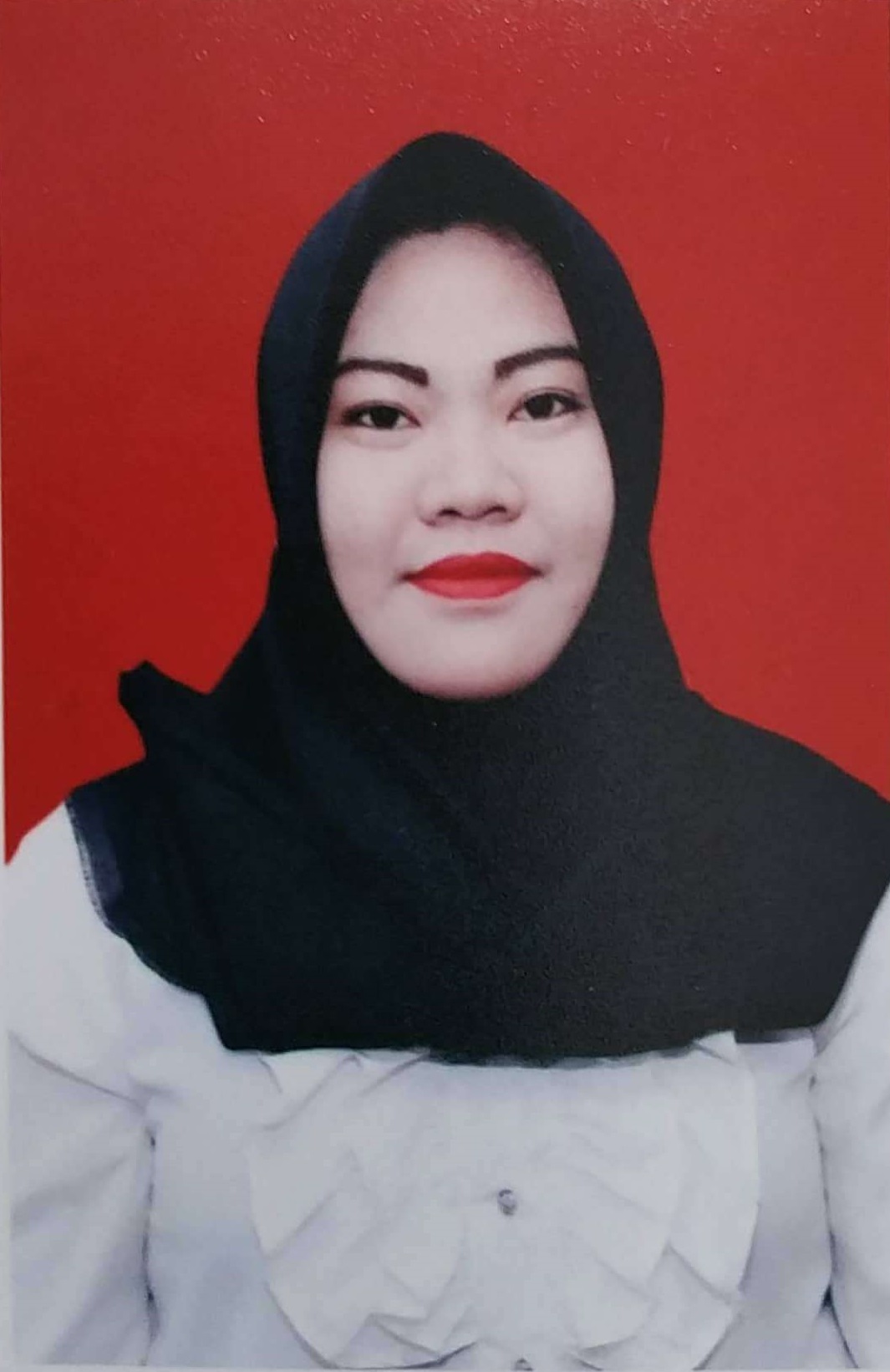 SRI KARTIKA MAMONTO, S.Pd.