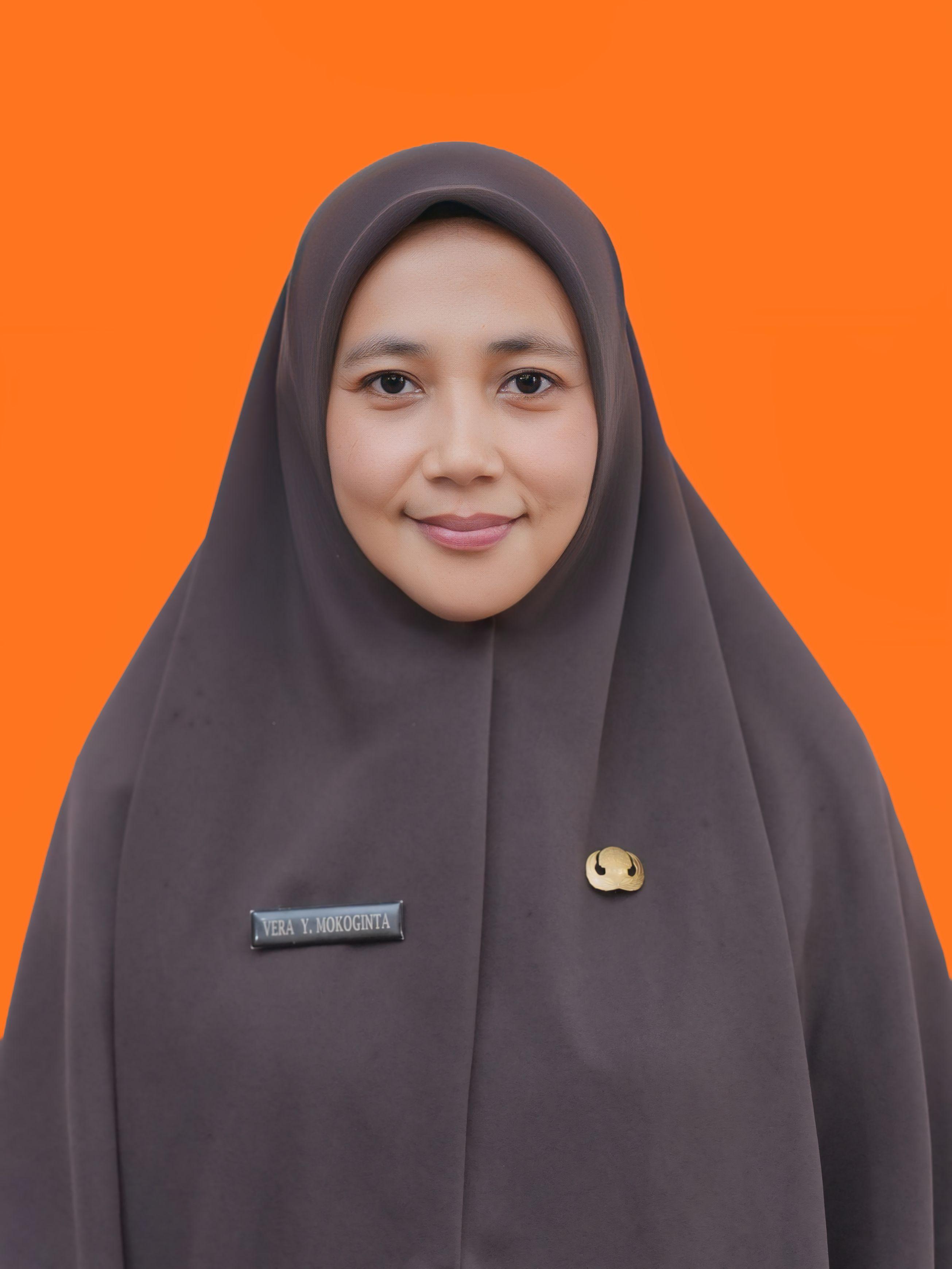 VERA YUNITA MOKOGINTA, S.M
