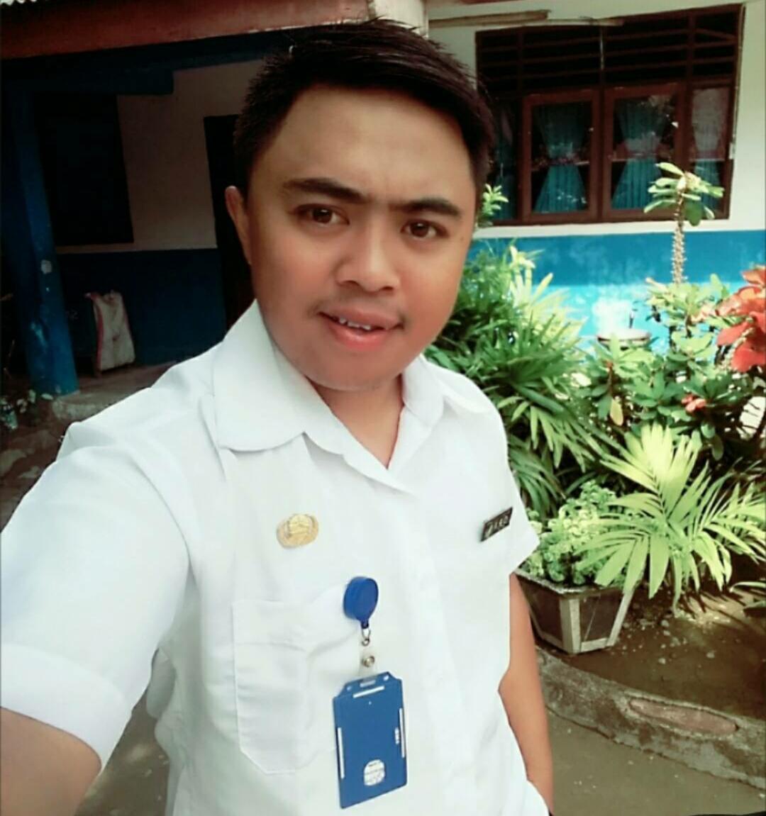 MANUMPANG OPAN MOKOGINTA, S.Pd.