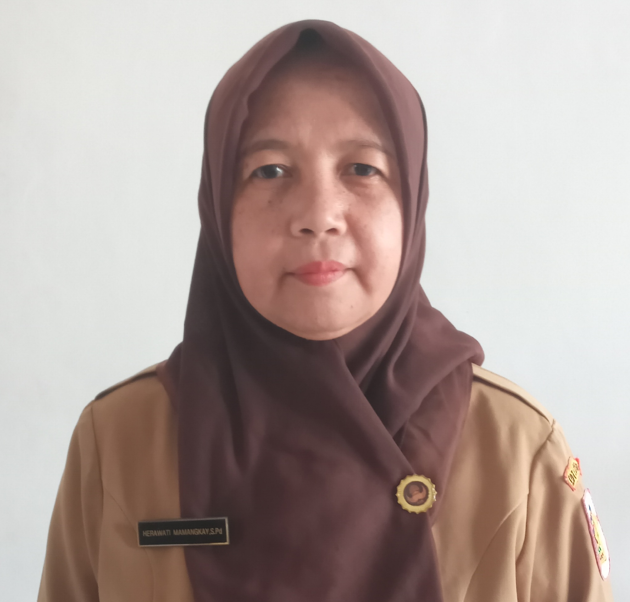 HERAWATI MAMANGKAY, S.Pd.