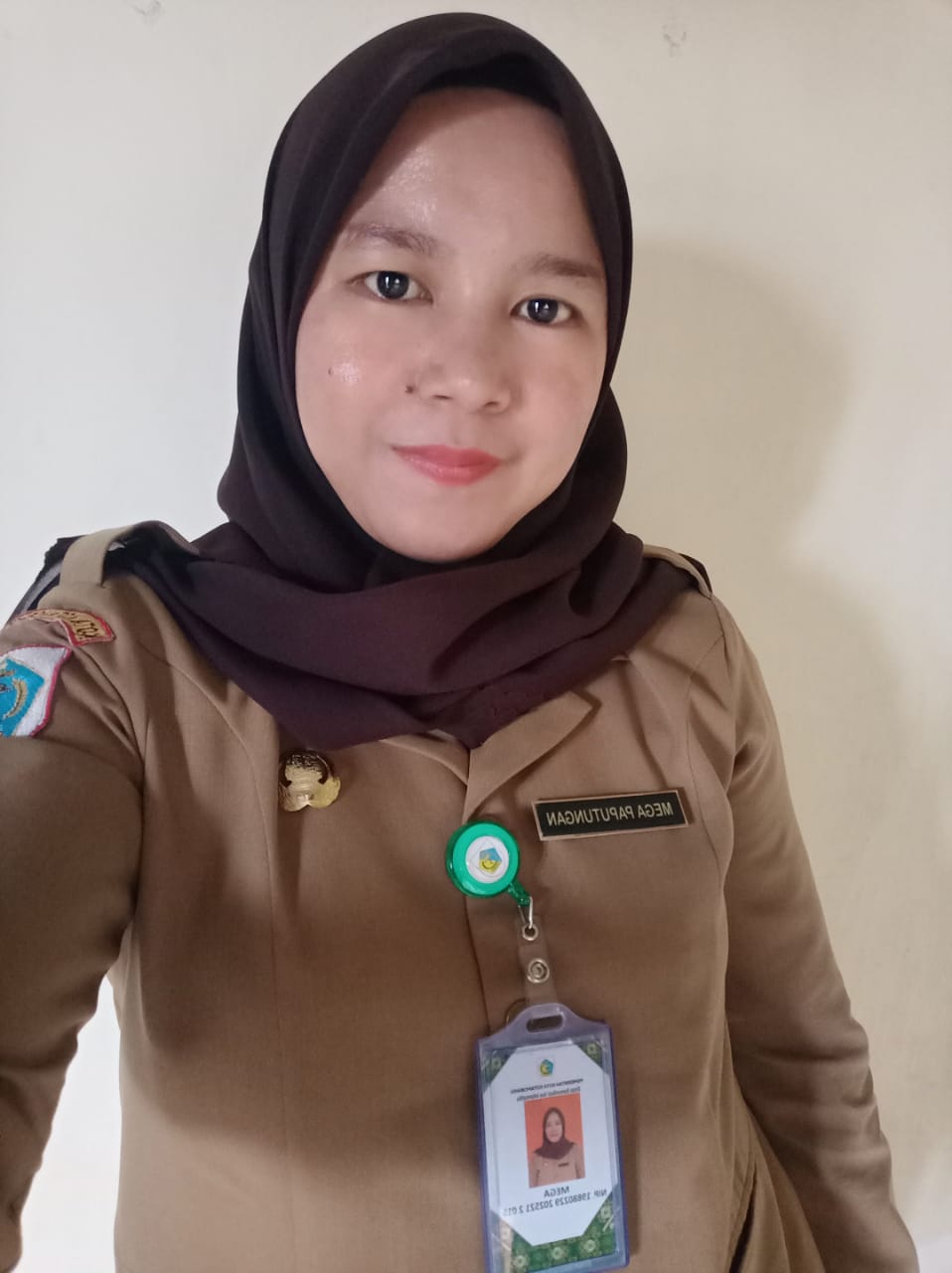 MEGAWATI PAPUTUNGAN, S.E.