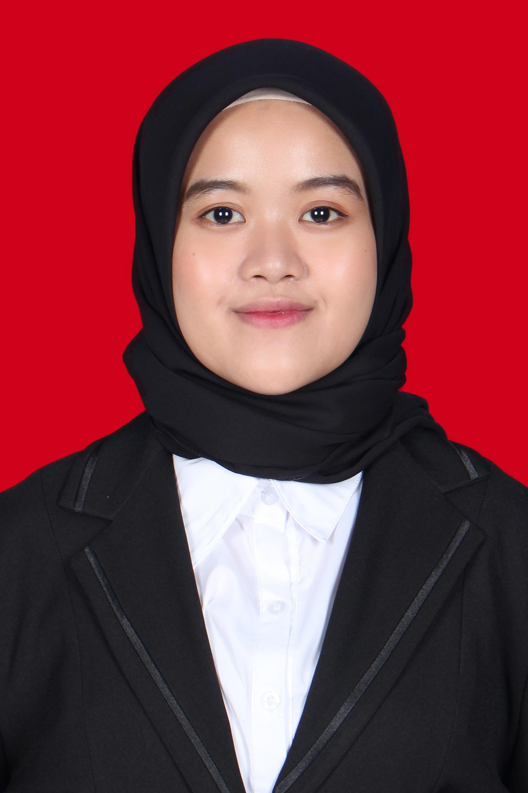 PINGKAN WULANDARI D. MOKOGINTA, S.Pd.