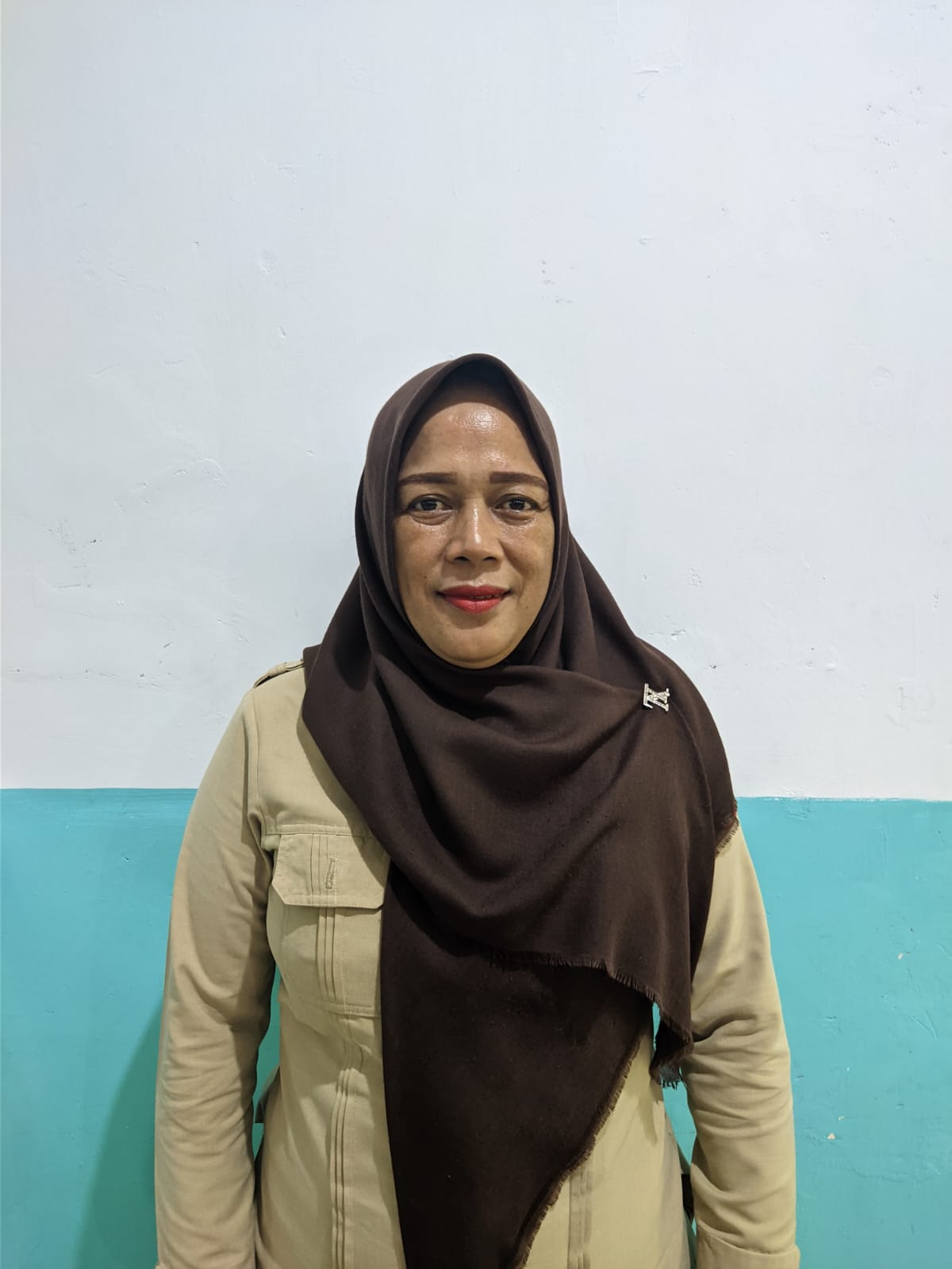 SALMI PAPUTUNGAN, S.Pd.