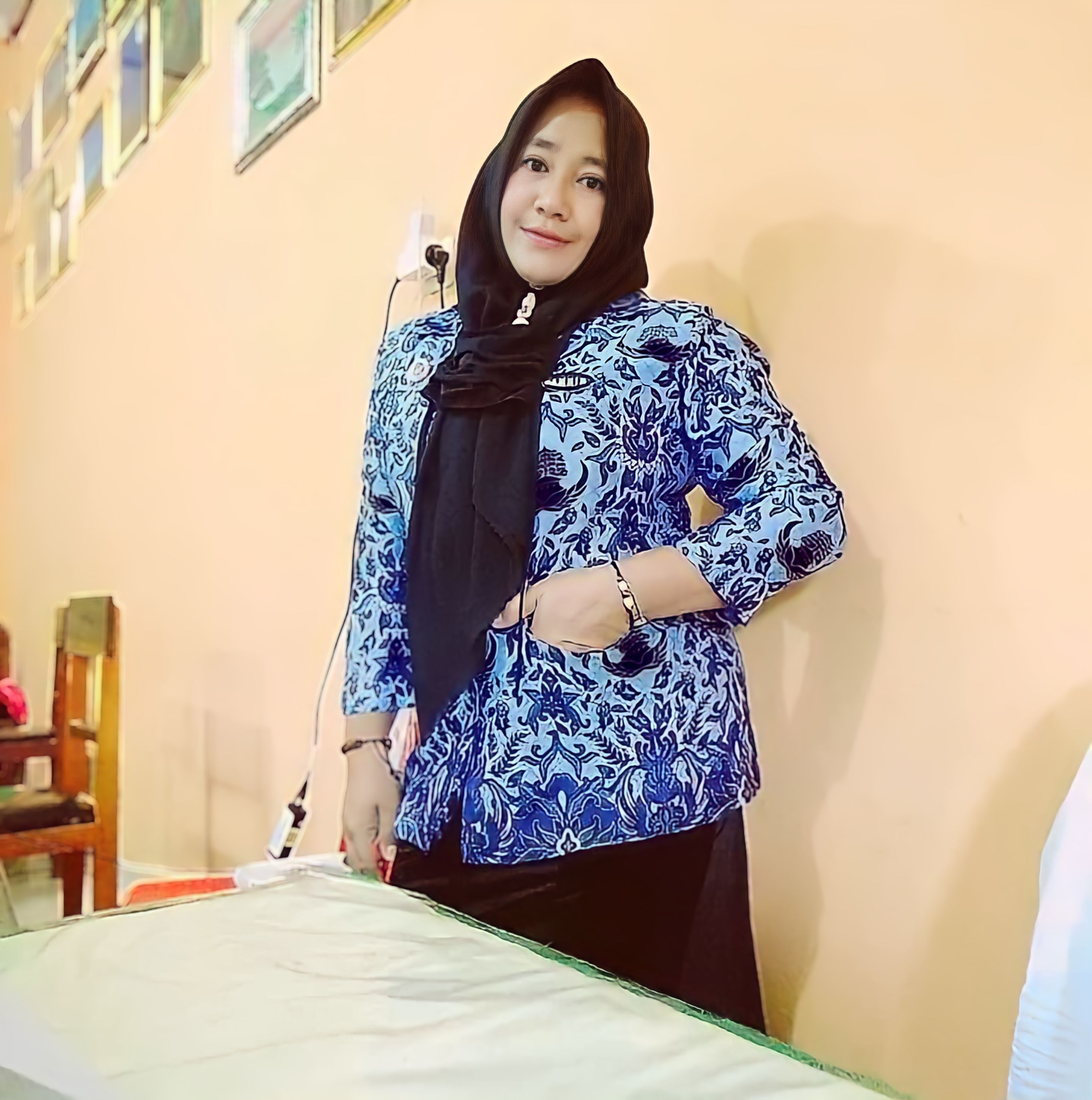 NIKMAWATI MAMONTO, S.Pd.