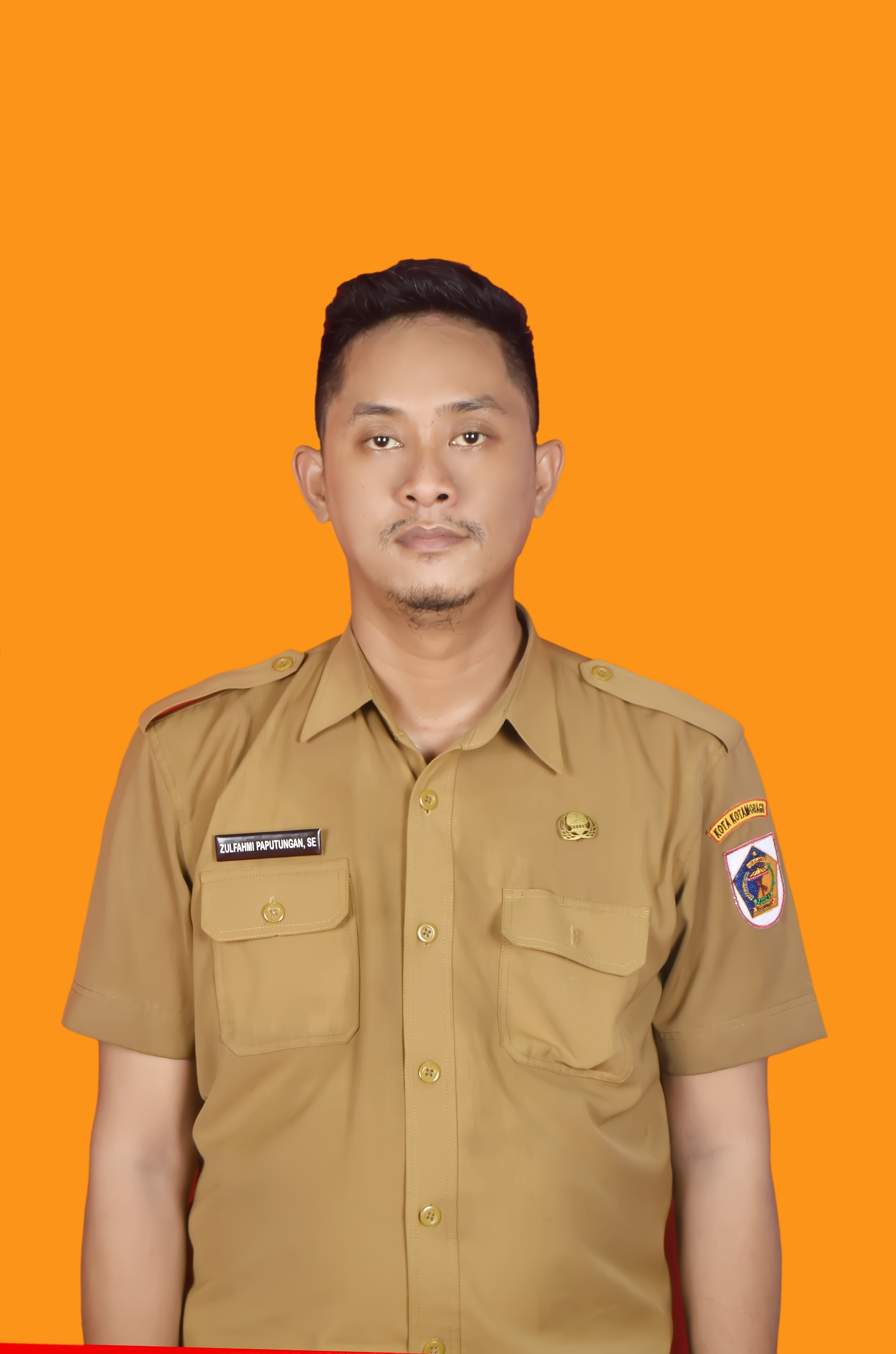 ZULFAHMI PAPUTUNGAN, S.E.