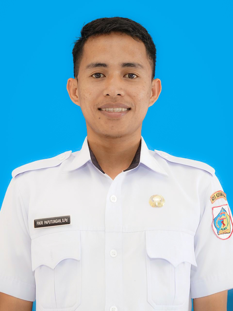 FIKRI PAPUTUNGAN, S.Pd.