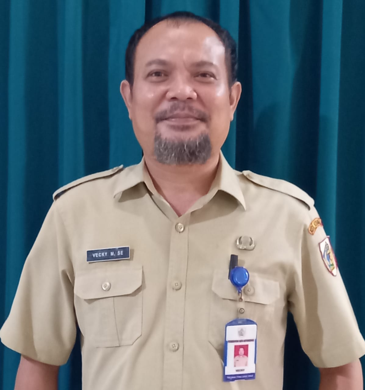 VICKY MANOPPO, S.E.