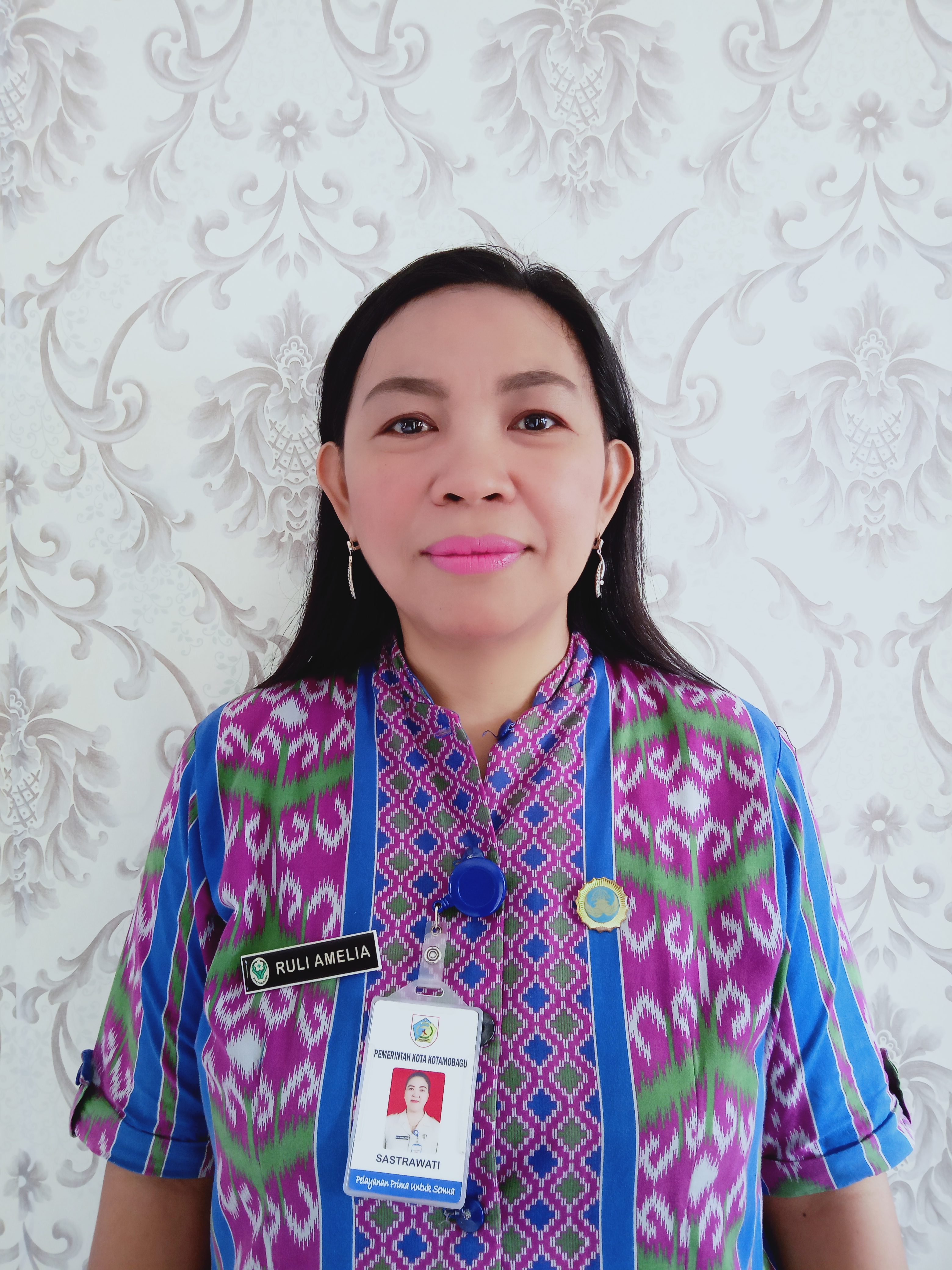 RULI AMELIA REMBANG, S.T.KL