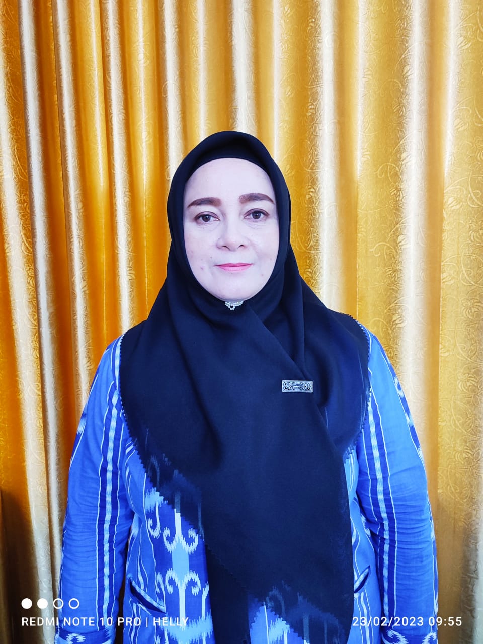 HELLY INTAN PAPUTUNGAN, S.E., M.E.