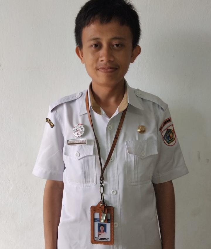 HARIADI MOKODOMPIT, S.Pd.