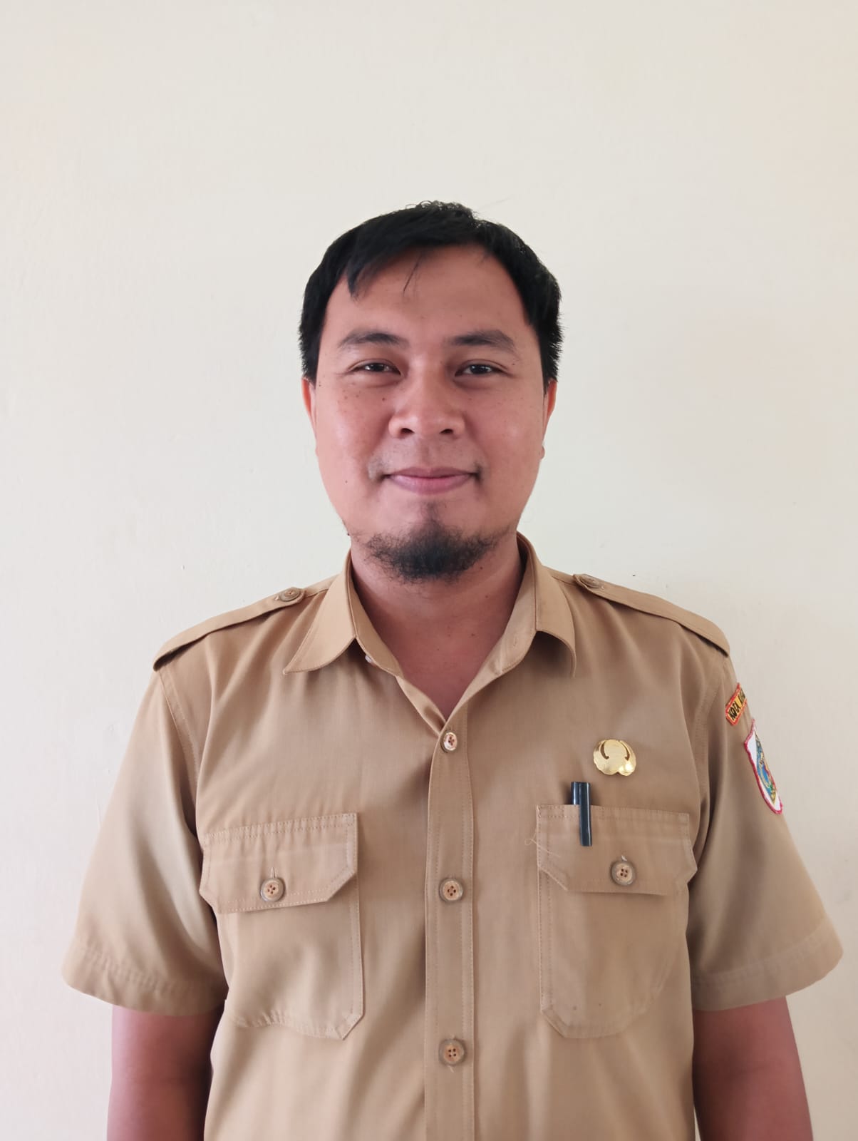 Meygi Setiawan Mokoginta, S.Pd.