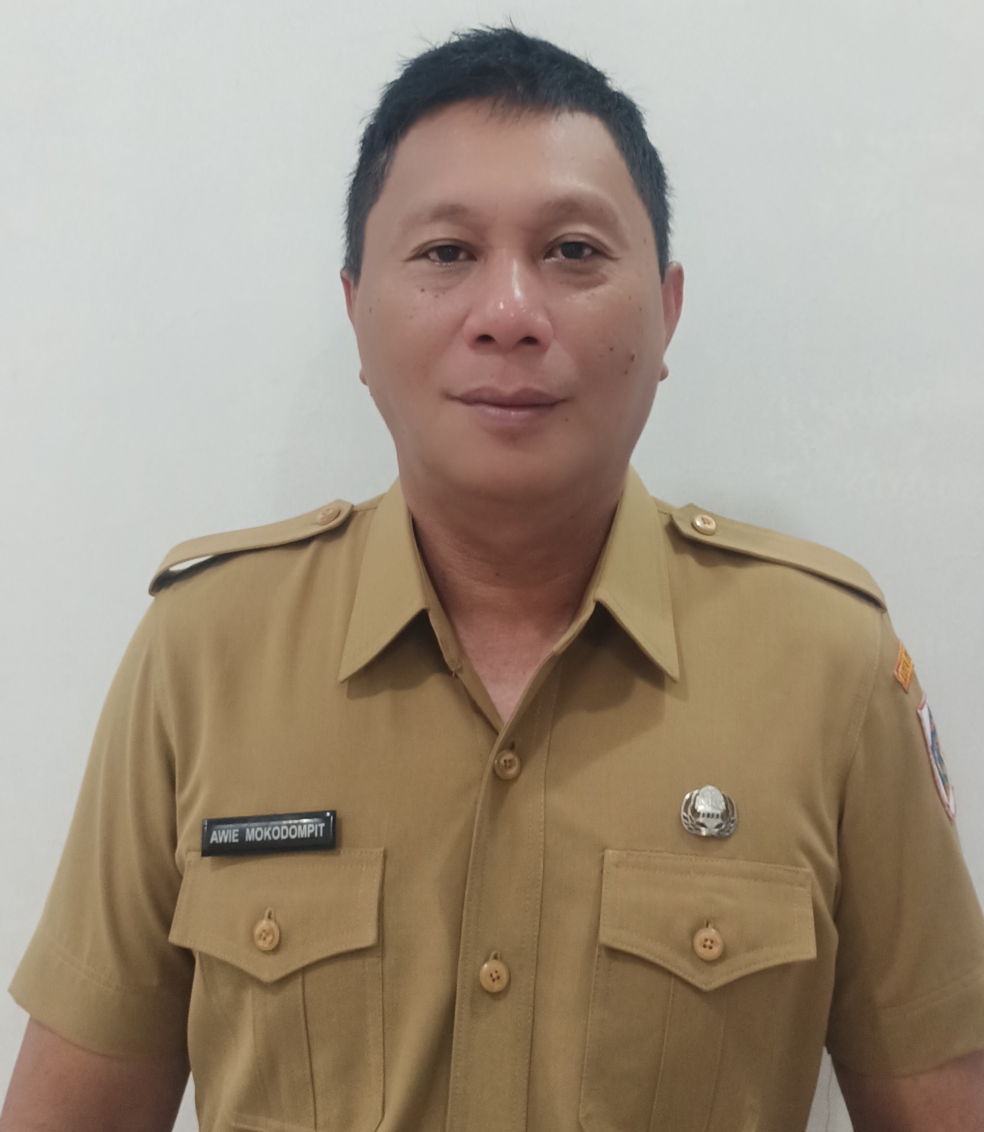 ASNAWI MOKODOMPIT, S.Sos.