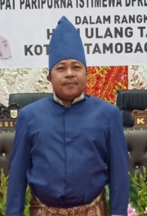 ARDIN PAPUTUNGAN, S.E., M.M. 