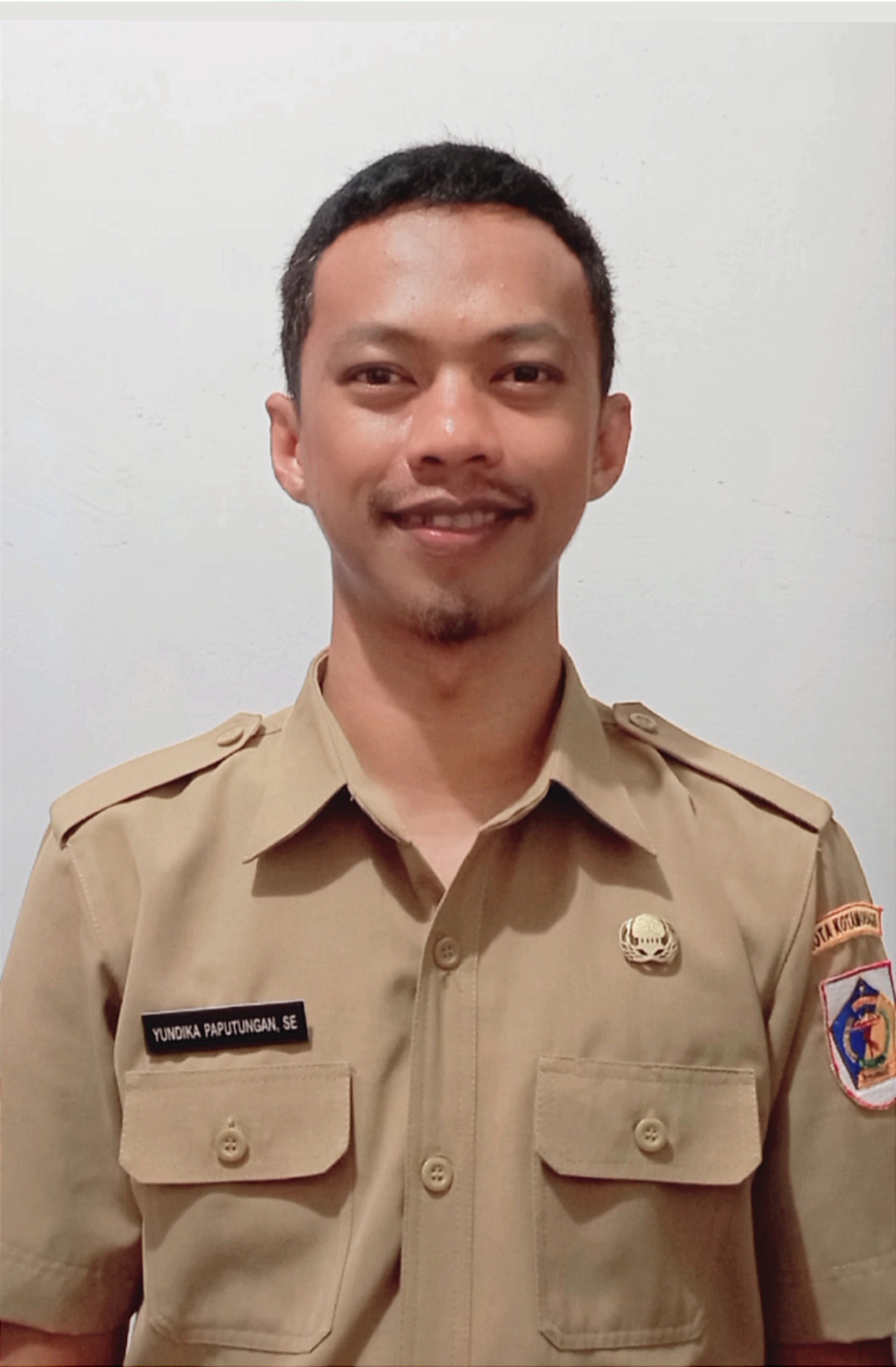 YUNDIKA PAPUTUNGAN, S.E.