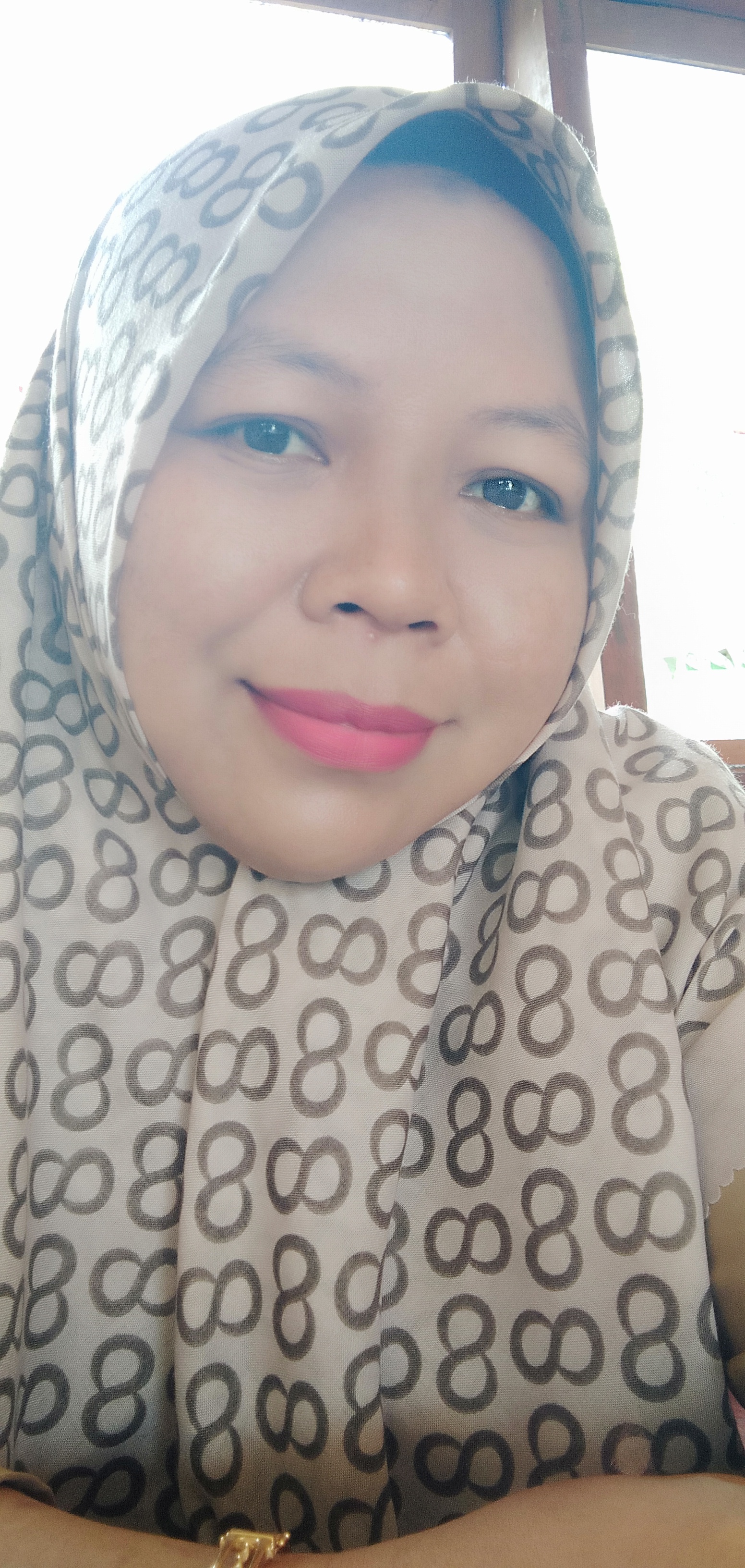 YOHANA PAPUTUNGAN, S.Pd.