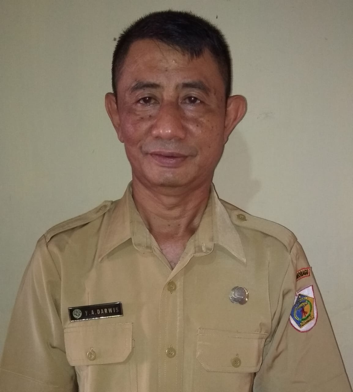 YUSUF DARWIS, S.I.P.